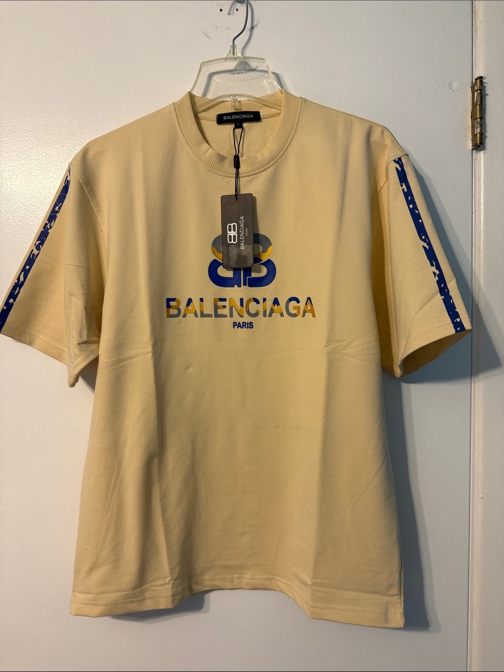 Balenciaga Cream Tee with Blue and Yellow Logo Detail